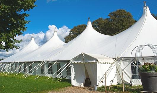 a group of luxury portable restrooms with individual stalls and running water in Crystal